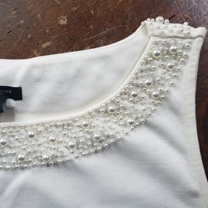 Ann Taylor ivory sleeveless blouse